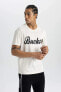 Фото #5 товара DeFactoFit NBA Milwaukee Bucks Bisiklet Yaka Ağır Kumaş Tişört