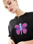 Фото #3 товара Weekday Unisex oversized t-shirt with butterfly cartoon print in black exclusive to ASOS