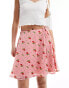 Фото #1 товара Wednesday's Girl flippy mini wrap skirt in pink floral