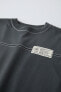 T-shirt with topstitching and label