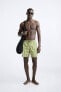 LONG GEOMETRIC PRINT SWIMMING TRUNKS