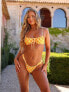 Фото #2 товара Kulani Kinis lemontini ruched thong bikini bottom in orange and yellow