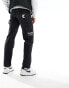 Фото #6 товара Karl Kani OG relaxed fit denim jeans in black with large logo embroidery