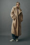 Extra-long faux shearling coat