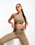 Фото #2 товара New Balance relentless sports bra in brown