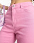 Pieces Petite Peggy flared jeans in pink