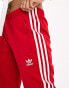 adidas Originals SST track pants in red