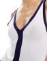 ASOS DESIGN knitted v neck vest in white with contrast navy trim