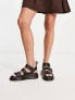 Dr Martens Gryphon quad sandals in black