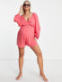 ASOS DESIGN Maternity floaty plunge crinkle playsuit in blush