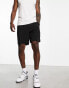 Фото #2 товара Hollister 7inch flat front chino shorts in black