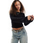 Фото #1 товара Monki knitted rib top with flared sleeves and low back in black