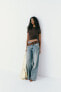 Trf wide-leg mid-rise deconstructed jeans