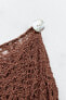 Asymmetric knit cape