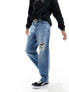 ASOS DESIGN baggy jeans with with rips in mid wash blue