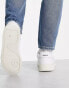 Фото #4 товара Levi's Glide leather trainer in white with chunky sole and red tab logo