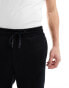 ASOS DESIGN oversized tapered joggers with cargo pocket detail in black