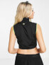 Lacoste motor inspired vest in black and lime