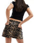 Фото #2 товара ASOS DESIGN denim mini skirt in leopard print