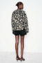 SNAKESKIN PRINT PUFFER JACKET