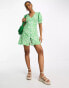 New Look button through tea mini dress in green floral