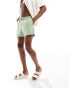 ASOS DESIGN swim shorts in short length in green