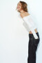 Asymmetric knit top