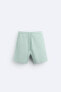 Compact jogger bermuda shorts