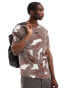 Фото #1 товара The North Face Oversized heavyweight t-shirt in brown geo print Exclusive at ASOS