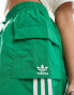 adidas Originals three stripe cargo shorts in green