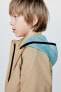 Water-repellent jacket with contrast trims