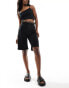 ASOS DESIGN longline shorts with leopard waistband in black