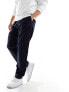 Фото #2 товара Tommy Hilfiger Tapered Chinos in Dark Blue
