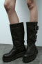 Track ankle boots with buckles