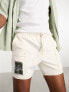 Фото #2 товара ASOS DESIGN slim shorter length denim cargo shorts with patch in ecru