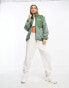 Фото #6 товара ASOS DESIGN Weekend Collective borg nylon zip through fleece in sage green