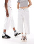 COLLUSION unisex skate jorts in reverse white