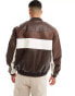 ASOS DESIGN oversized faux leather cut and sew bomber jacket in brown