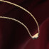 Něžný pozlacený náhrdelník se zirkony T-Logo TJAXC10