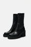 Ribbed sock ankle boots with track sole