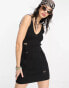 Reclaimed Vintage knitted festival mini dress with distressing in black