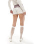 Фото #4 товара Reclaimed Vintage mini hot pant short with fold over waistband in cream