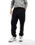 Nike Club woven Barcelona trousers in black