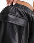 ASOS DESIGN leather look turn up utility shorts in black Черный, 32 - фото #3