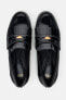 Flat loafers with metal detail
