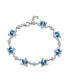 ფოტო #1 პროდუქტის Nautical Aquatic Tropical Beach Vacation Iridescent Synthetic Blue Created Opal Inlay Sea Tortoise CZ Accent Heart Multi Charm Turtles Bracelet For Women Sterling Silver