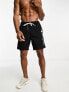 Фото #4 товара Champion Legacy beach swim shorts in black