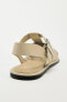 Flat leather cage sandals