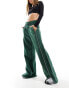 Фото #1 товара Nike Streetwear oversized fleece wide leg jogger in dark green