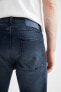 Фото #6 товара Slim Comfort Fit Normal Bel Dar Paça Yırtık Detaylı Jean Pantolon